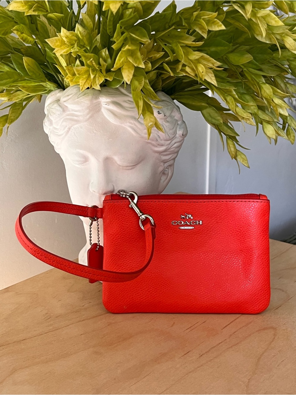 Coach Orange Leather Wristlet with Silver Logo and Hangtag